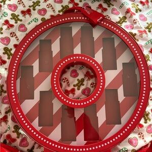 Red and White Striped Display Case